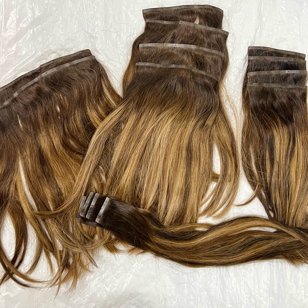Human hair extensions clip in